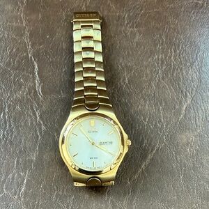 Citizen Eco-Drive Gold Watch with White Dial